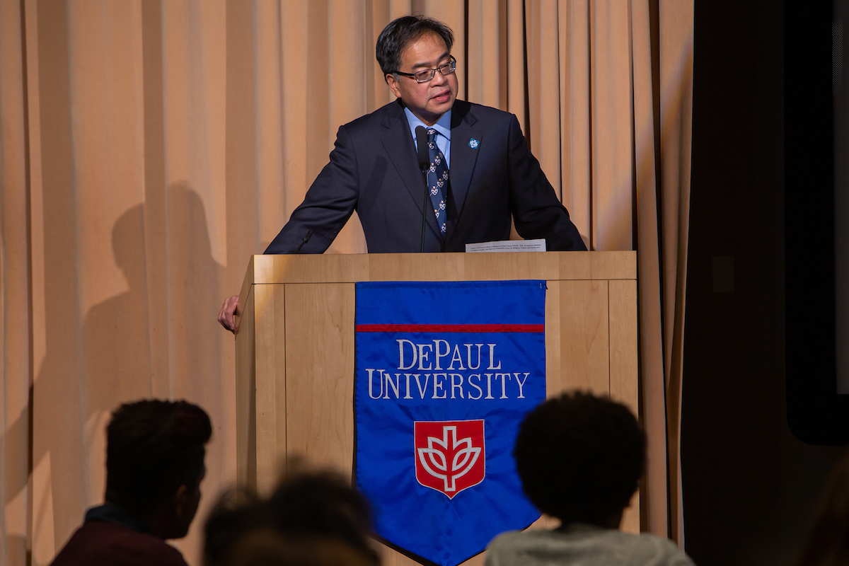 A. Gabriel Esteban, Ph.D., president of DePaul, introduces speaker and activist Jose Antonio Vargas during the President’s Lecture Series event on Nov. 14. (DePaul University/Randall Spriggs)